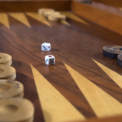 The numbers lie: travails with a backgammon app